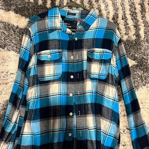 Blue plaid American eagle dress shirt.